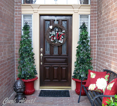 updating curb appeal by freshening up the front porch, curb appeal, outdoor living, Topiaries made out of tomato cages for only 30 instant WOW Tutorial at Curb Alert blog