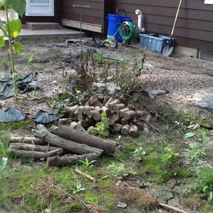 gravel pit what to do, gardening, landscape, There is a stump behind that pile of wood