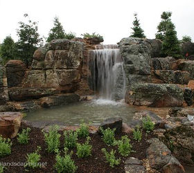 world s most extreme ecosystem fish pond construction by certified aquascape, go green, outdoor living, patio, ponds water features, Finished Aquascape Ecosystem Fish Pond Waterfall Pond Behind these Waterfalls is a Cave Constructed by the largest group of professional Pond Builders in the World Certified Aquascape Contractors