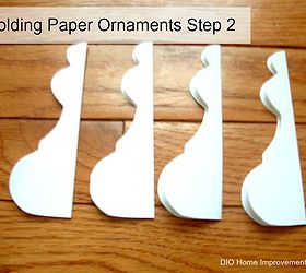 architectural molding inspired paper ornaments, crafts, seasonal holiday decor, woodworking projects, Fold each piece in half