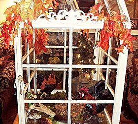 mini greenhouse from old windows that changes with the seasons, Add some fall foliage and the greenhouse is complete