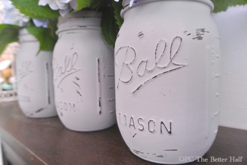super easy painted mason jars with flowers, crafts, flowers, gardening, home decor, mason jars, Once the paint was completely dry I used a sanding block to distress the high points on the jar