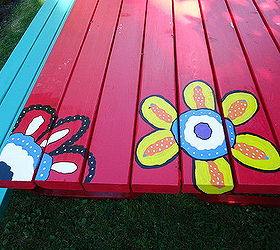painting a unique picnic table, painted furniture, Second flower rolls off the edge just a bit