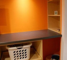 a functional laundry room, This is the folding station and storage area These drawers were custom made on site and use Blum Tandem slides with Blumotion soft close You can also find a place for the cats litter box in here