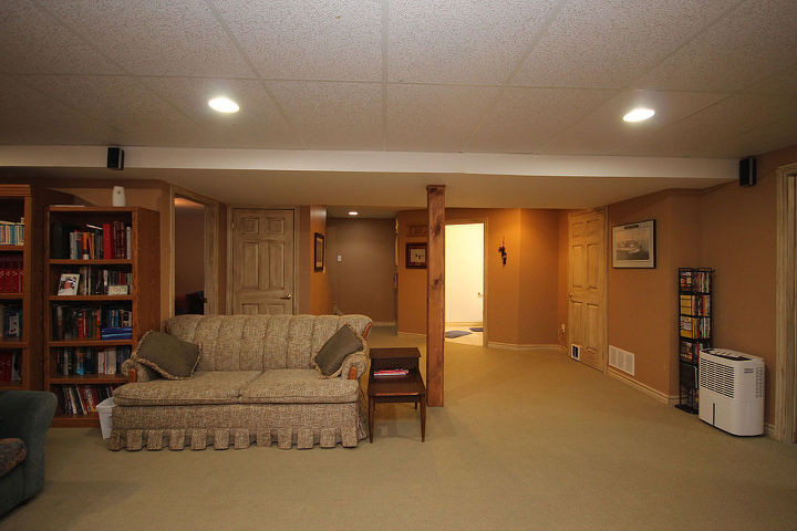 q best flooring for basement, basement ideas, flooring, Before Realtor photos This carpet doesn t look too bad but it s actually a green carpet and is faded to beige