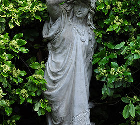 classic garden ornaments, concrete masonry, gardening, outdoor living, Contrast helps this classic figure stand out against the background foliage