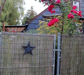 diy beautify a chain link fence with bamboo, diy, fences, outdoor living, Bamboo screening creates privacy for this cottage garden