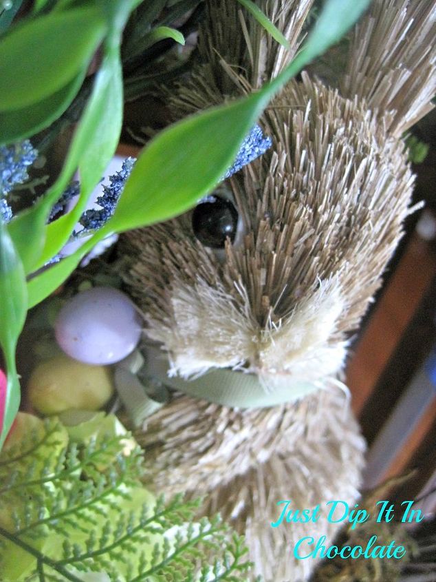 rabbit burrow spring wreath, crafts, easter decorations, seasonal holiday decor, wreaths, This little guy is holding some Easter Eggs the touch is so minimal that you could leave the wreath out even pass Easter making it perfect for the whole Spring Season