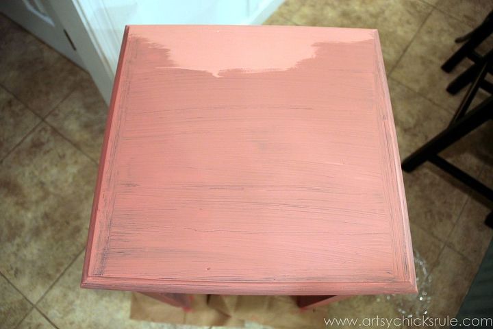 thrifty side table makeover annie sloan chalk paint, chalk paint, home decor, living room ideas, painted furniture, Applying the second coat Great coverage over this black paint