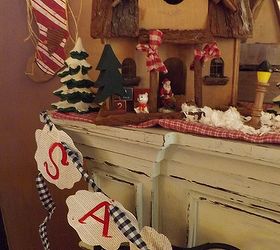 a sweet tea n salty air country christmas tour, christmas decorations, seasonal holiday decor, A cottage and trolley share a Christmas mantle