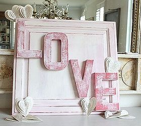 love sign made from an old cabinet door, crafts, painting, repurposing upcycling, seasonal holiday decor, valentines day ideas, An old cabinet door found curbside was transformed with Paper Mache letters and some CeCe Caldwell paints