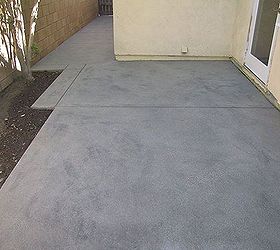 Newly poured concrete has dark spots and streaks throughout..HELP!