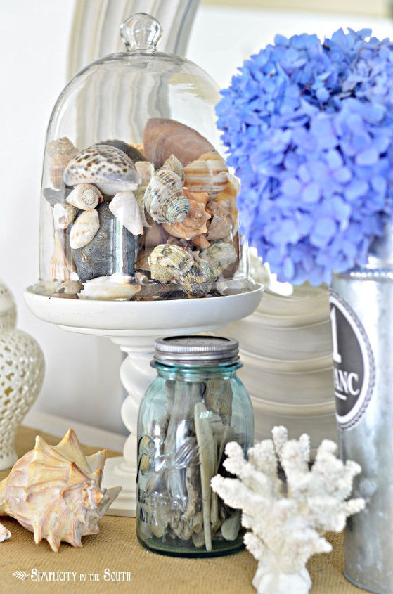 a simple summer vignette, home decor, Glass cloche with sea shells collected from our honeymoon and family vacations