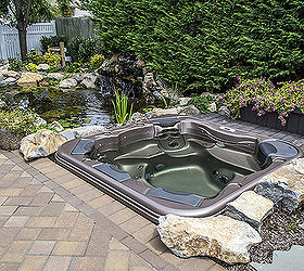 project spotlight love water features love to relax this is the best of both enjoy, outdoor living, patio, ponds water features, pool designs, spas, Imagine yourself sitting in the warm soothing water with a ground level view of this pond and waterfall