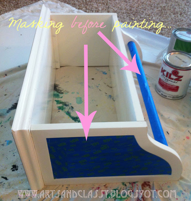 upcycling a goodwill find old bathroom storage shelf, painted furniture, shelving ideas, storage ideas, I masked off the areas that I did not want to paint the Pewter color I chose with blue painters tape Splurge for the tape that doesn t allow ANY PAINT to get past its seal