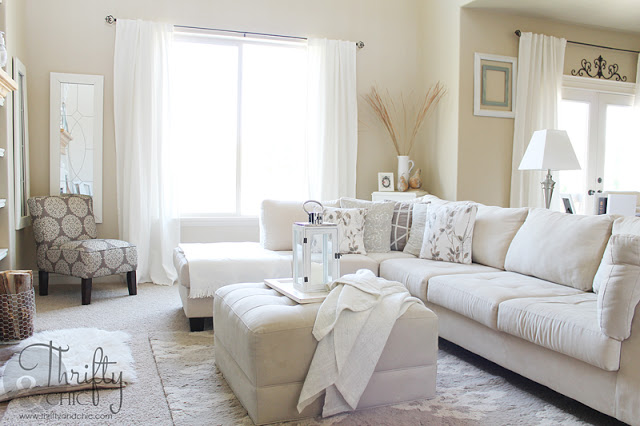 white living room, home decor, living room ideas, living room with soft ottoman