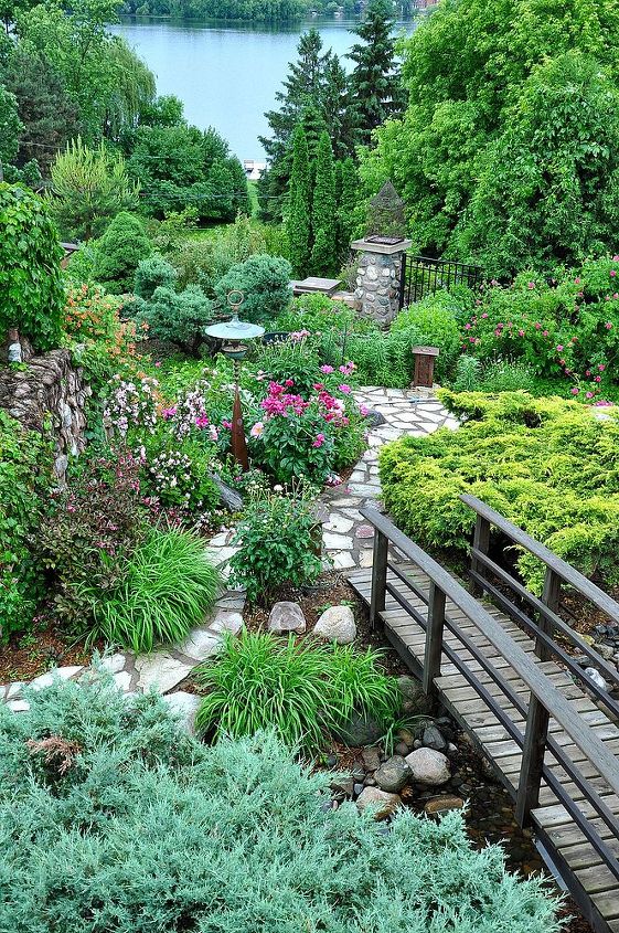 stroll through the garden, flowers, gardening, outdoor living, perennial, ponds water features, Bridge over the pond and stone walkway through the peonies