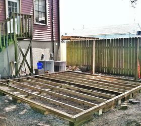 backyard deck in new orleans, 2x4s rest on top of 6x6 supports 3 inch Deck screws connect all framing