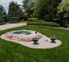 before a fountain after a pondless waterfall with bronze statuary, gardening, ponds water features, A close up of the formal fountain Notice the lush vegetation behind the fountain You cannot see the home behind it