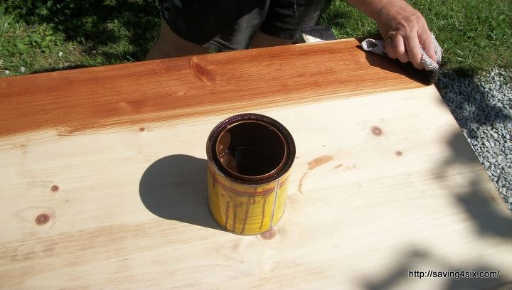 5 steps to refinish a table top or desk, painted furniture, woodworking projects, Applying stain with a rag helps to control exactly where the stain goes