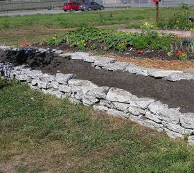 how to build a rock garden, gardening, landscape, succulents, The wall is three layers high and not mortared As it was built each layer was laid to lean just slightly toward the center of the garden to prevent tipping Safety is paramount