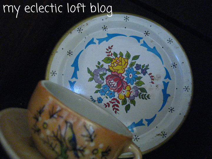 adding vintage decor to my home, home decor, repurposing upcycling, shabby chic, Ohioart toy tin plate and one of my play tea cup and sauce from when I was a child