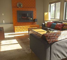 would you paint your brick fireplace a bold orange we did, fireplaces mantels, home decor, living room ideas, painting, And this is what we ve got now We love what a few cans of orange paint have done for our family room
