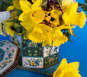 arranging flowers in vintage tins, flowers, gardening, home decor, repurposing upcycling, This tin cost me a whole 3 Doesn t it look pretty filled with daffodils and pansies