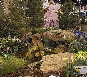 wizard of oz garden with ponds and water features, gardening, outdoor living, ponds water features, Kindly Good Witch Glinda is standing behind our spouting rock that cascades into a small pond