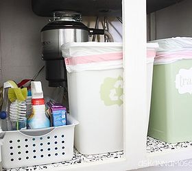 under the kitchen sink organization, organizing, Everything fits perfectly and is easy to access despite the huge garbage disposal right in the middle of the cabinet