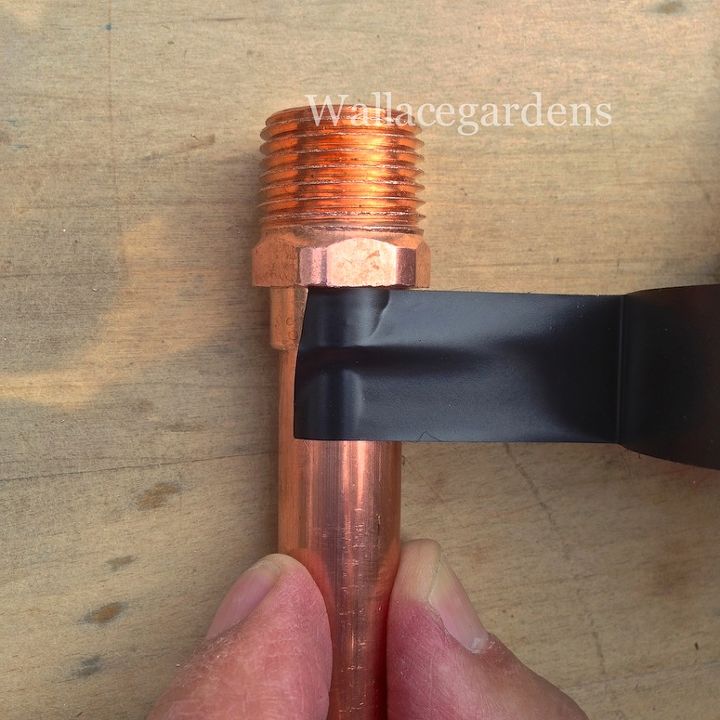 wine bottle watering device with copper tubing for container gardens