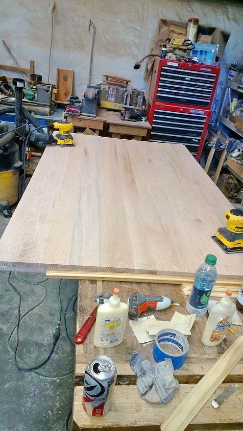 kitchen island made from 3 4 birch plywood and 1 oak board top, diy, kitchen design, kitchen island, woodworking projects, Sanding the top after the boards are glued and dry