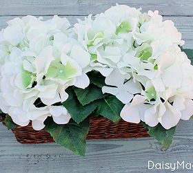 how to make a flower arrangement out of a hydrangea bush, crafts, flowers, gardening, home decor, hydrangea, Fill in the gaps to hide the foam with the leaves And you re done