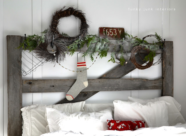 decking the halls on a horse gate headboard, bedroom ideas, christmas decorations, seasonal holiday decor, The headboard indeed tells a story this season it s wintery cold outside so make sure you have plenty of blankets which got changed out to white for the season