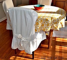 weekend project refresh and revive your dining room, dining room ideas, home decor, Lighten and brighten your chairs and table Just adding brighter lighter cotton slipcovers to your chairs can take a darker chair like this