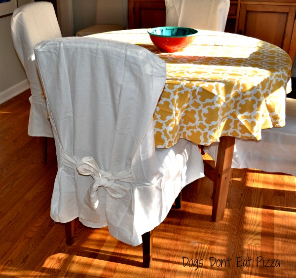 weekend project refresh and revive your dining room, dining room ideas, home decor, Lighten and brighten your chairs and table Just adding brighter lighter cotton slipcovers to your chairs can take a darker chair like this
