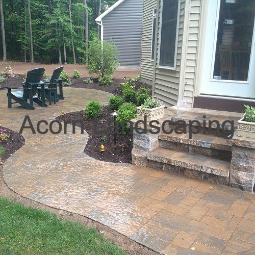 amazing backyard waterfall fish pond with paver patio transformation greece ny by, Steps Techo Bloc Paver Patio Walkway Plantings and Water Feature in Greece NY by Acorn Landscaping Certified Aquascape Contractor of Rochester NY