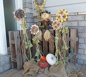 falling for pumpkins and sunflowers, curb appeal, gardening, outdoor living, repurposing upcycling, seasonal holiday decor, I got the pattern for the sunflowers from a 1997 Country Marketplace magazine I had planned on making them back then but never got around to it Those are dryer duct pumpkins I also made laying below the sunflowers
