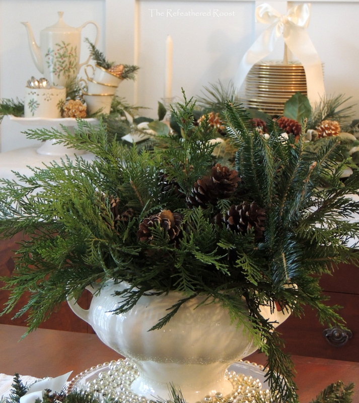 christmas in the dining room, christmas decorations, dining room ideas, seasonal holiday decor, A centerpiece with cypress clippings and pine cones from our woods