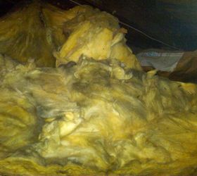 is your house cold drafty expensive to heat, heating cooling, home maintenance repairs, This is some of the newer insulation blanket that was placed over the older insulation within the attic Notice the black streaks This is caused by air flowing up from around the walls within the attic