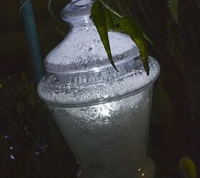 recycled glass glowing diy garden lights, lighting, outdoor living, repurposing upcycling, Portable glowing lights work great tucked around the garden at night for a special event