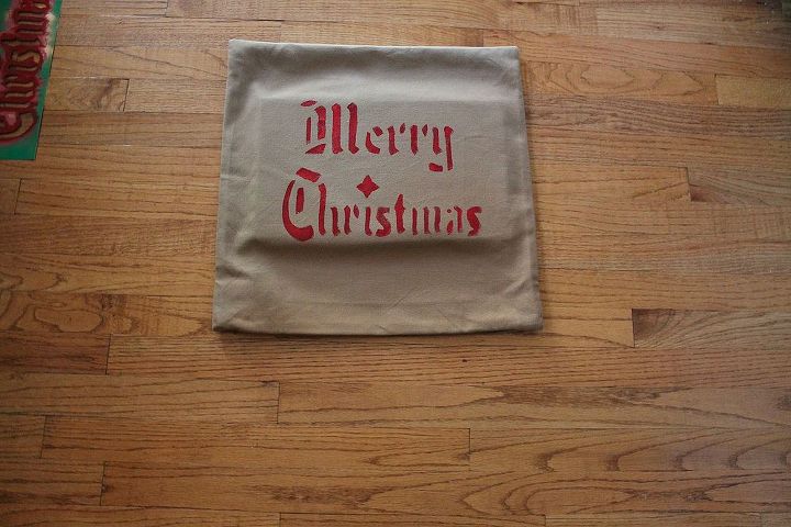plain goodwill pottery barn pillows transformed into christmas pillows, crafts, seasonal holiday decor, after the stencil is painted and dried I let mine sit 2 days I used and iron with a towel in between to heat set the paint