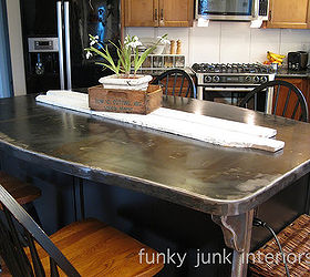 a bullet proof funky metal kitchen island top, countertops, home decor, This double sided metal kitchen island top serves double duty It s a counter and kitchen table all in one The curvy corners help to visually diminish the size as well as add a personal touch