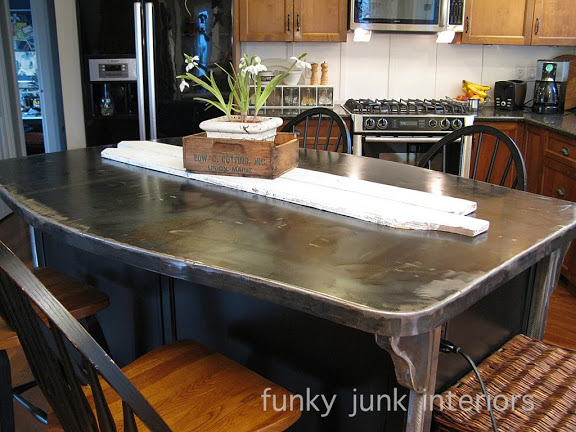 a bullet proof funky metal kitchen island top, countertops, home decor, This double sided metal kitchen island top serves double duty It s a counter and kitchen table all in one The curvy corners help to visually diminish the size as well as add a personal touch