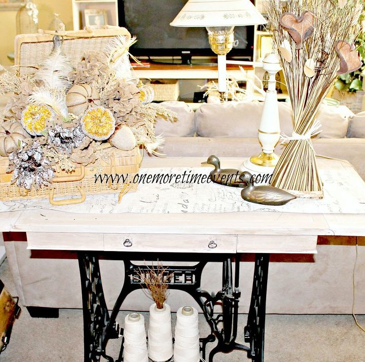 hydrangea fall floral centerpiece and how to clean silks, cleaning tips, painted furniture, repurposing upcycling, seasonal holiday decor, Old Antique sewing machine repurposed with an antique coffee table turned into sofa table for more on how this was done you can go herehttp www onemoretimeevents com 2012 04 re purposed antique singer sewing html