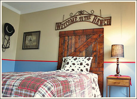 decorating a boy s bedroom, bedroom ideas, home decor, The headboard sign and sheets added so much character A red handkerchief sitting under the lamp was a cheap decorating idea for sure An old hat and reins hang on the wall and help a little boy dream about being a cowboy