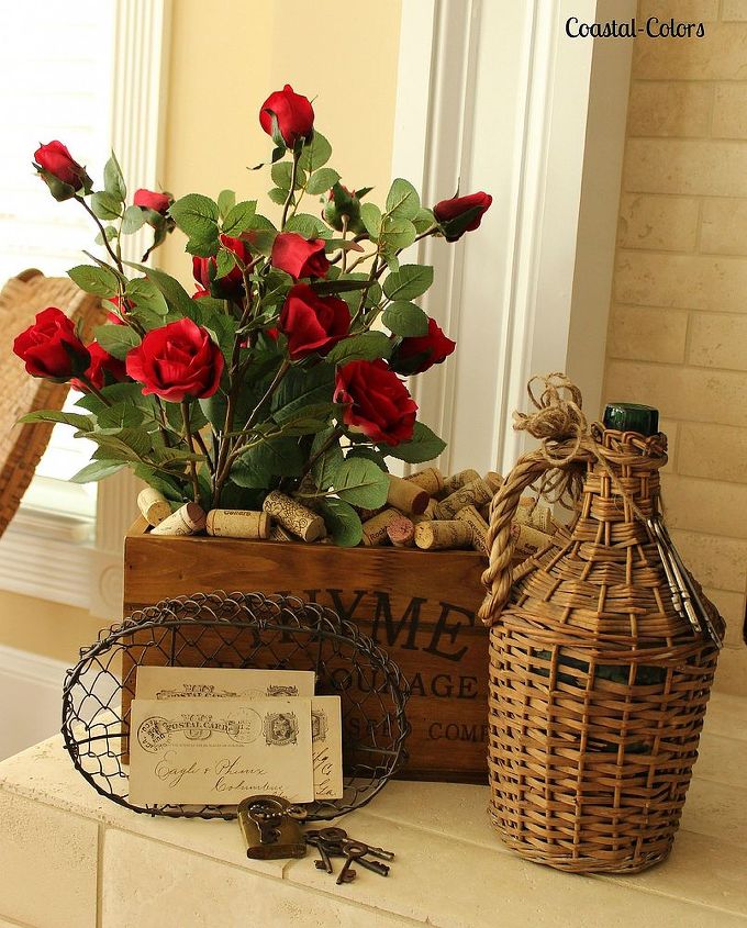 valentine s day mantel simple craft projects, fireplaces mantels, seasonal holiday d cor, valentines day ideas, Red roses corks vintage keys post cards and demijohn complete this area