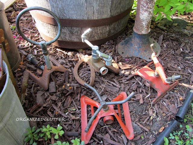 vintage garden farm tools are perfect for a junk garden, flowers, gardening, Display them in groups in mulched areas