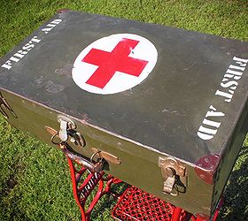 repurposed wwii military first aid storage suitcase table w sewing machine base, repurposing upcycling, Custom graphics were stenciled and painted onto the top of the vintage suitcase and then distressed