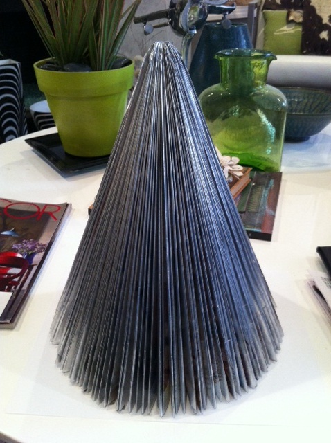 old magazines turned into christmas trees using simple origami, christmas decorations, crafts, seasonal holiday decor, Spray paint to the color desired I use a silver chrome spray on mine